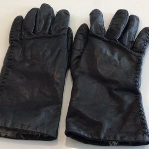 Black leather gloves with rabbit fur lining.
